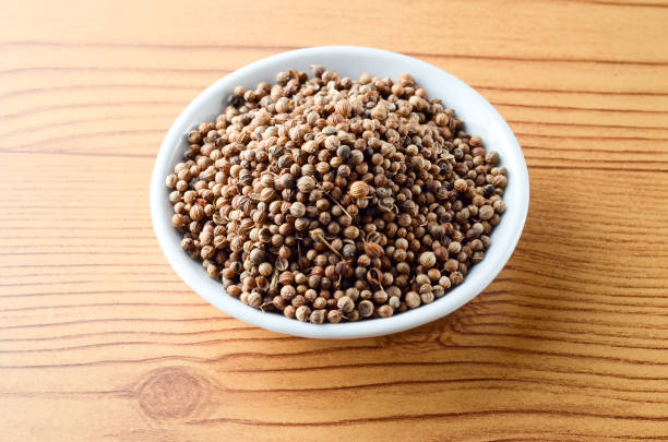 istock Spice seed in bowl over wooden background 803193542
