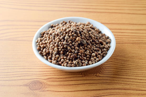 istock Spice seed in bowl over wooden background 803200312