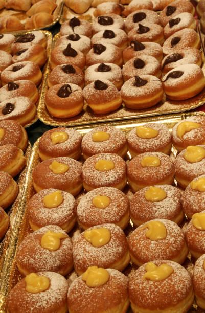 istock trays with cakes and donuts with cream 803201058
