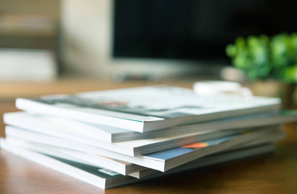 selective focus of  stacking magazine place on table in living room