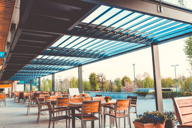 Outdoor restaurant terrace with tables and chairs, roof, outdoors, eating and drinking, travel destinations