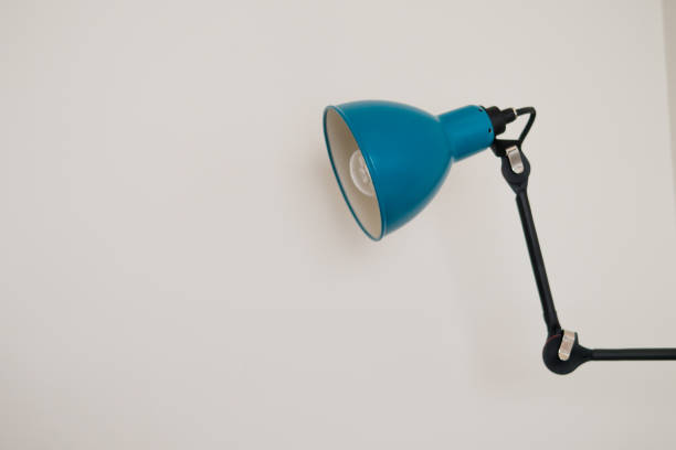 istock bed lamp or desk lamp on the wall 803247174