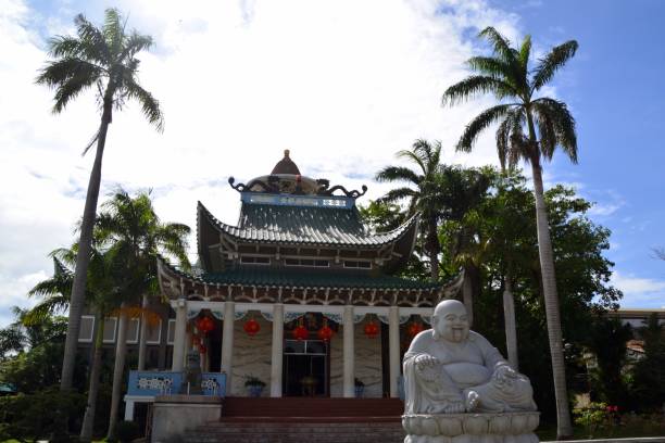 Longhua Temple in Davao, Mindanao, Philippines Longhua Temple, front view with smiling Buddha statue. It is one of the biggest Buddhist temples in the Philippines and the biggest in the island of Mindanao.
 davao city stock pictures, royalty-free photos & images