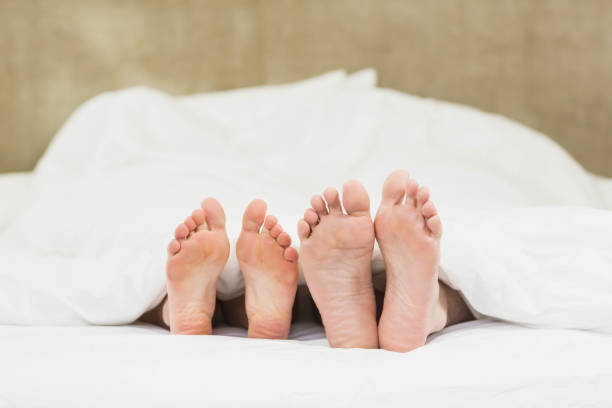 istock Close up of couples feet 803250628