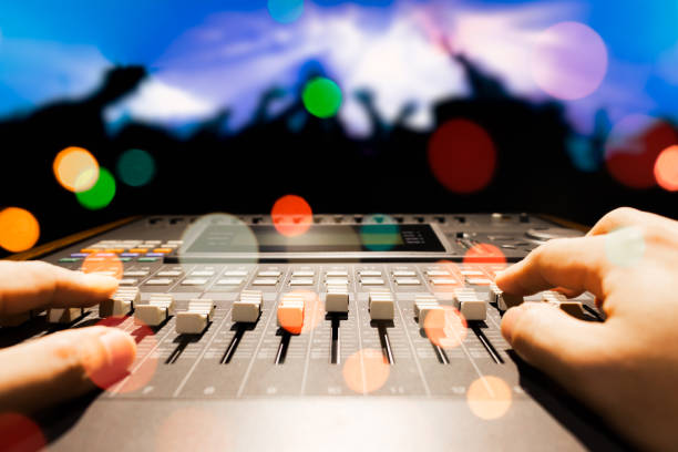 istock sound engineer hands working on sound mixer in live concert 803257834