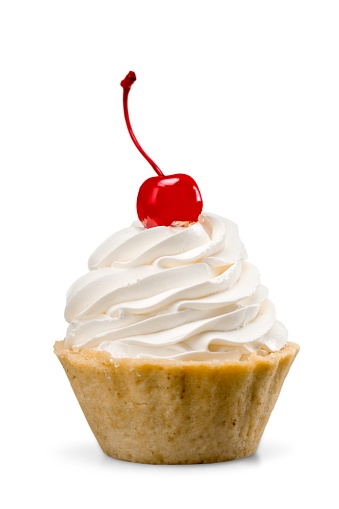 Cupcake/dessert with whipped cream and a cherry on top - isolated image