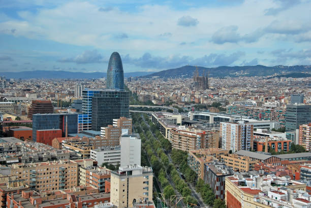 Skyline of Barcelona Skyline of Barcelona. Aerial view of diagonal avenue, Agbar building and Sacred Family. Barcelona. Spain avenida diagonal stock pictures, royalty-free photos & images