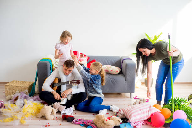 istock Mother cleaning mess at home 803270906
