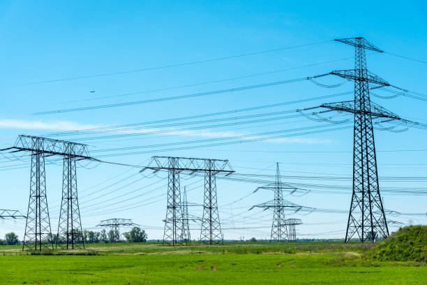 istock Transmission cables and towers 803271540