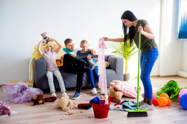 istock Mother yelling on her romping kids 803274126