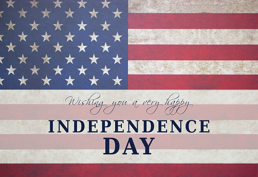 Independence Day greeting card with american flag background.