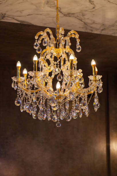 istock Beautiful chandelier. luxury expensive chandelier hanging under ceiling 803294404