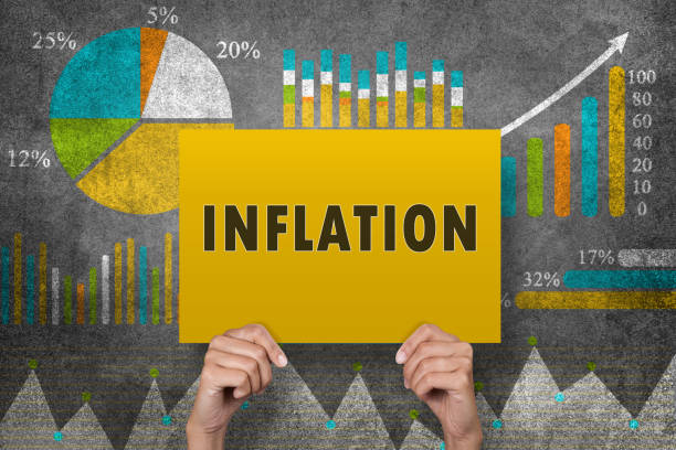 inflation sign in front of financial report - despair finance report business imagens e fotografias de stock