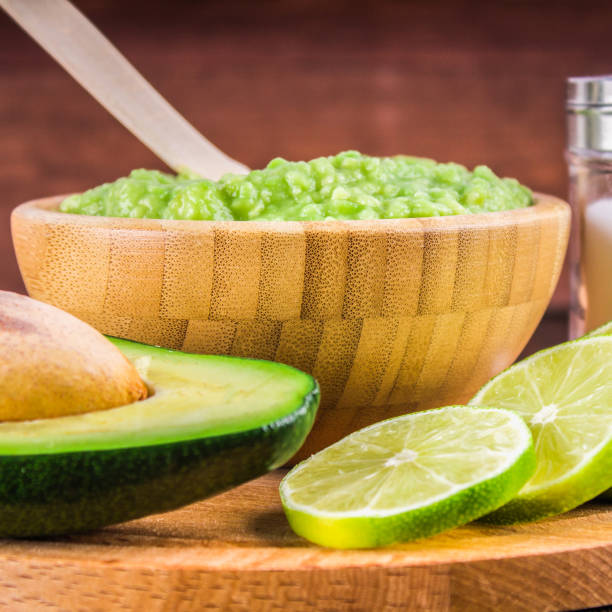 istock avocado Guacamole on molcajete real Mexican traditional procedur 803303254