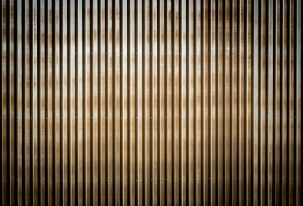 istock Old rusty corrugated metal wall of a barn building 803303400