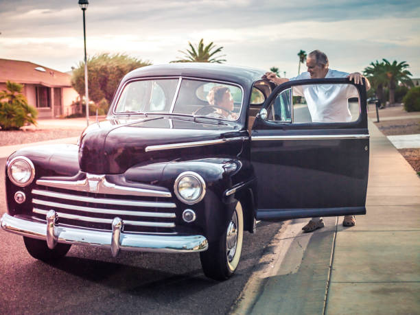 istock Senior couple with retro car 803303824