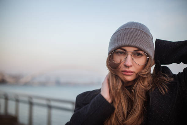 Portrait of a young woman standing outdoors
