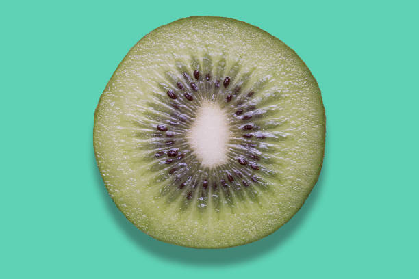 istock Kiwi on colorful background 803317654