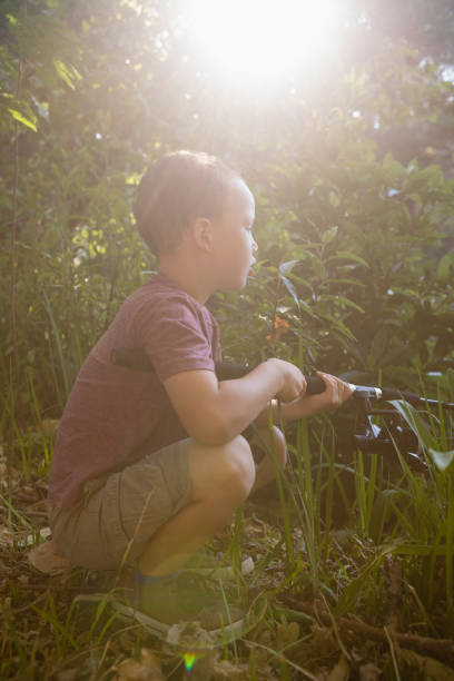 istock Boy fishing in the river 803317702