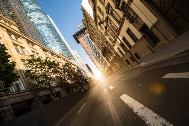 istock frankfurt germany skyscraper street sun composing 803325780