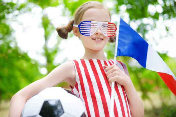 istock Adorable little soccer fan cheering 803325930