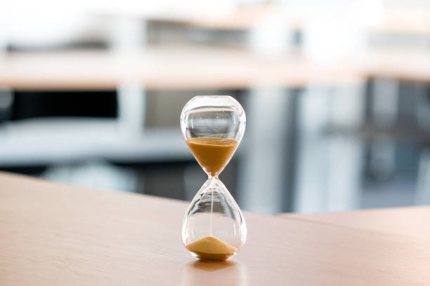 istock Sand clock, business time management concept 803387602