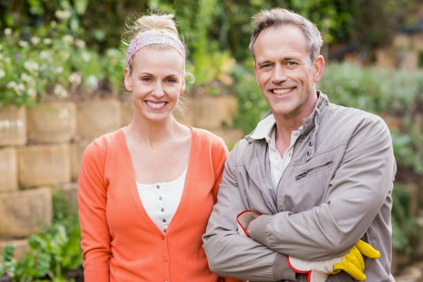 istock Cute couple smiling at camera 803429712