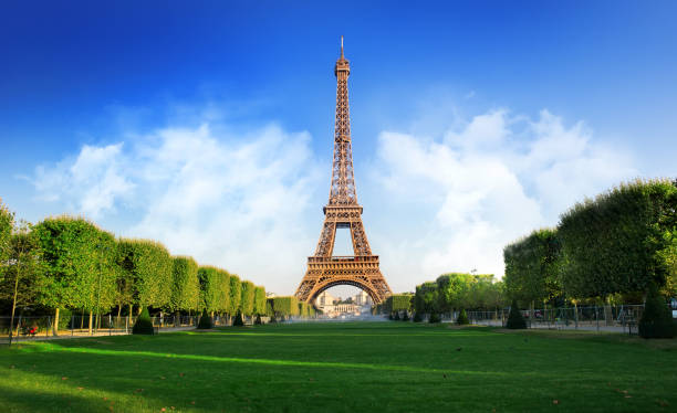 Fields of Mars Eiffel Tower and Champs de Mars in Paris, France champ de mars stock pictures, royalty-free photos & images