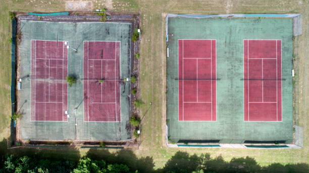 istock Old tennis courts - aerial view 803445152