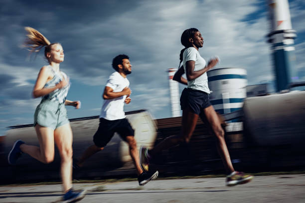 istock Joggers running outdoors 803454442