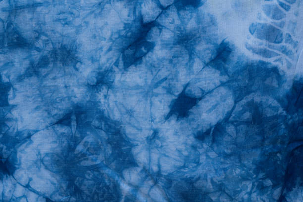istock Painted blue watercolor on white cotton cloth 803459848