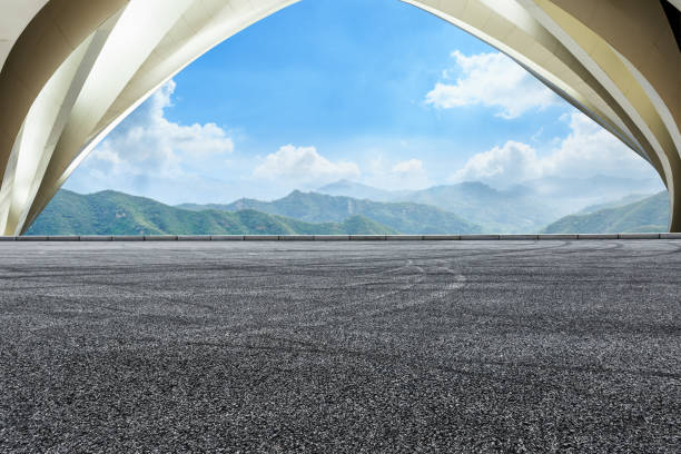 istock asphalt road and mountain under the blue sky 803473826