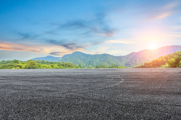 istock asphalt road and mountain at sunset 803479930