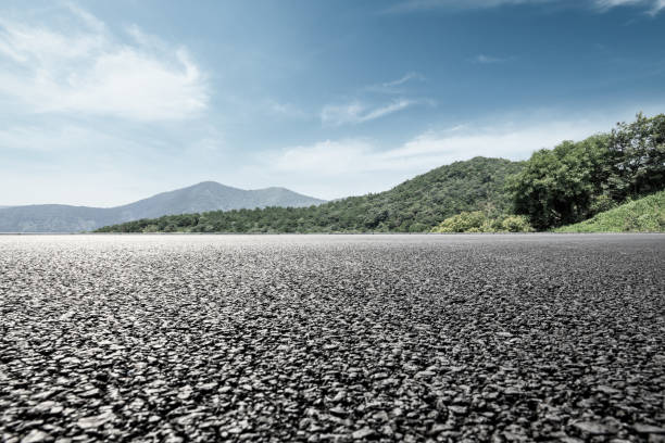 istock asphalt road and mountain background 803482480
