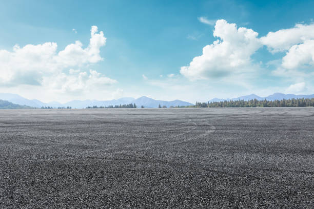 istock asphalt road and mountain background 803482482