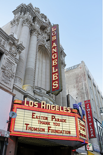 Los Angeles, USA - June 17, 2017: The theatre façade and marquee of the Los Angeles theatre - one of the city’s first movie palaces (c. 1930). The lavish landmarks served as a major movie premier house. It is part of the Broadway Theater Historic District.