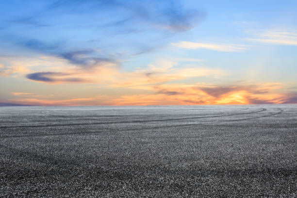 istock new asphalt road and sky at sunset 803485862
