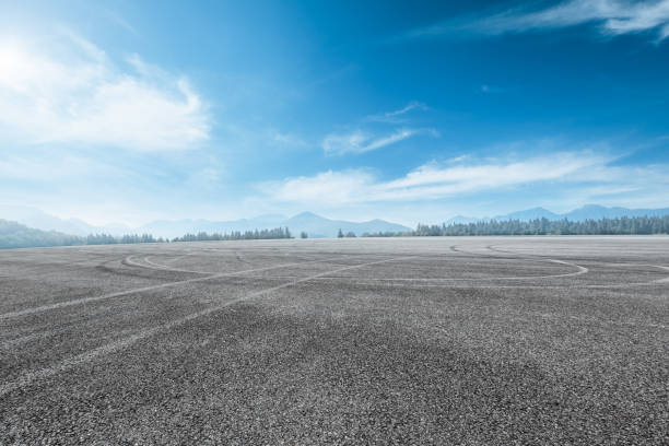 istock asphalt road and mountain background 803488124