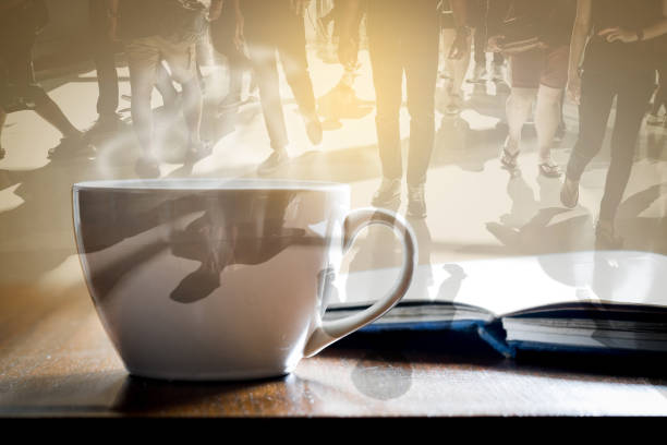 Double exposure cup of hot coffee and people walking in the morning. Feeling fresh and ready to work.