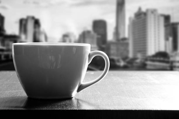 istock Cup of coffee on wooden table in cafe 803488516