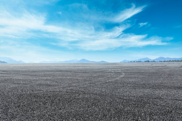 istock asphalt road and mountain background 803491164