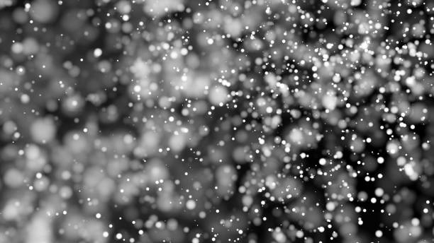 istock Beautiful monochrome bokeh blurred background defocused lights 803499838
