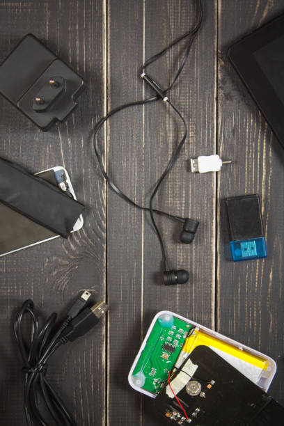 istock Electronic devices and elements on a dark wooden background. Place for the text. A concept for Father's Day. The programmer's desk. Hobby. 803506402