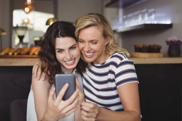 istock Happy friends taking selfie from mobile phone 803510680
