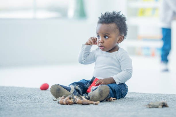 istock Baby and Toy Car 803513374