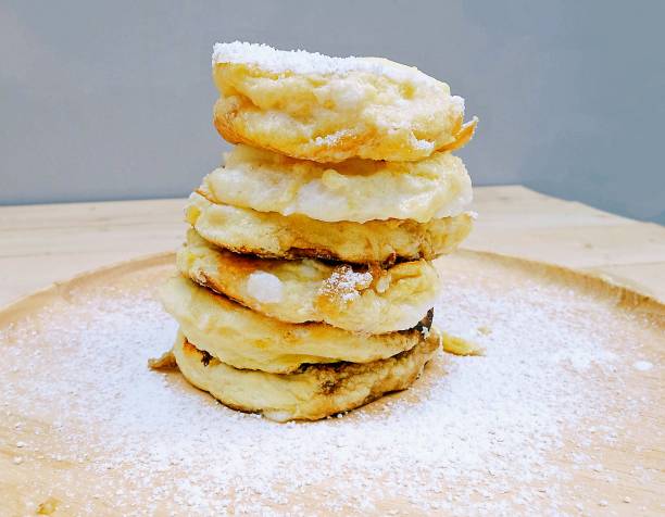 Pancakes in dish on Table wood