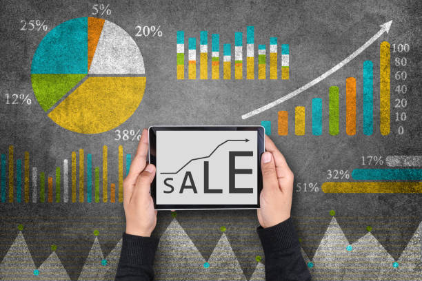 istock Sales growth concept in front of financial report 803577828