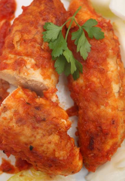 istock Sea fish eggs cooked in tomato sauce 803587324