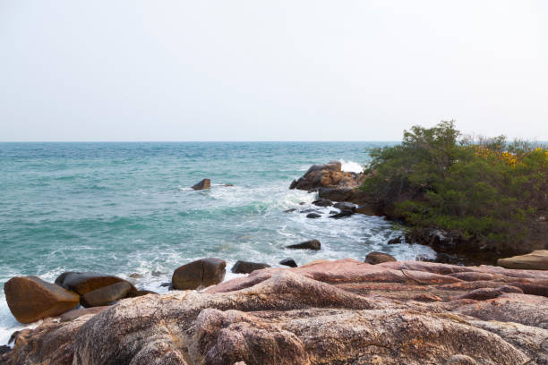 istock Rocks, sea wave and blue water 803588808