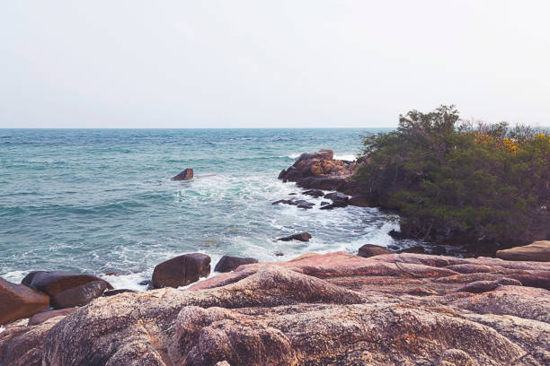istock Rocks, sea wave and blue water 803588822